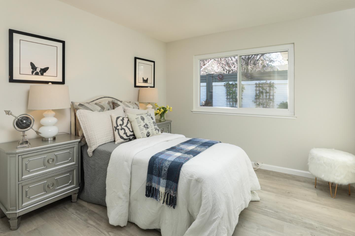 4057 Ashbrook Circle San Jose, CA 95124 - Photo 9 of 15 a bedroom with a bed and a window