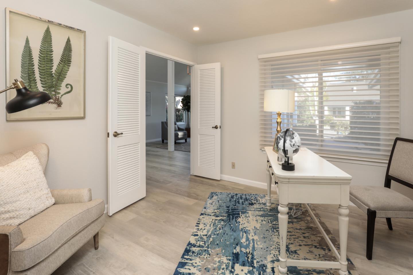 4057 Ashbrook Circle San Jose, CA 95124 - Photo 10 of 15 a living room with furniture and a large window