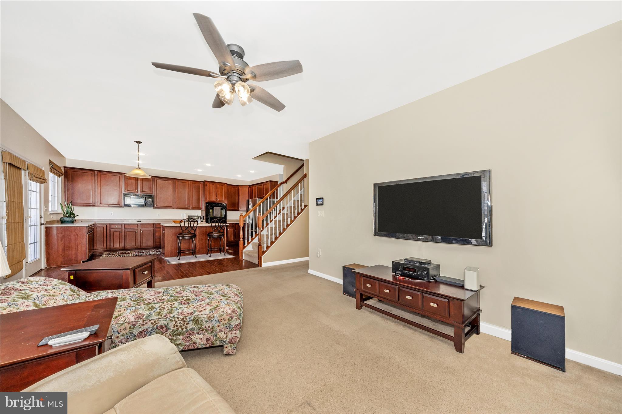 214 Union Ridge Drive Charles Town, WV 25414 - Photo 15 of 57 a living room with furniture and a flat screen tv