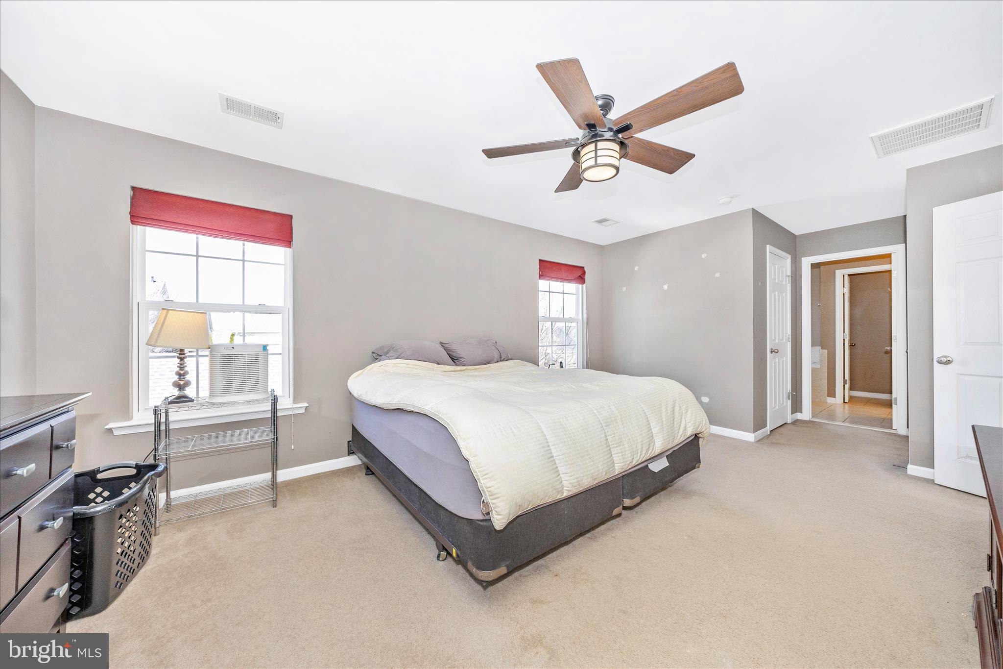 214 Union Ridge Drive Charles Town, WV 25414 - Photo 19 of 57 a bedroom with a bed and a ceiling fan