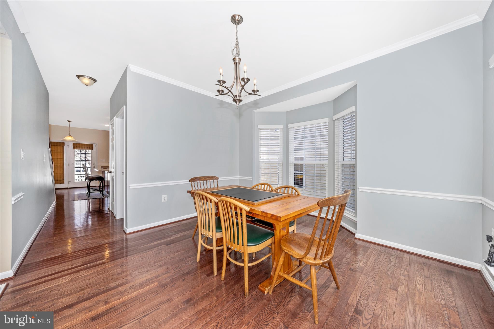 214 Union Ridge Drive Charles Town, WV 25414 - Photo 7 of 57 a view of a dining room with furniture window and wooden floor
