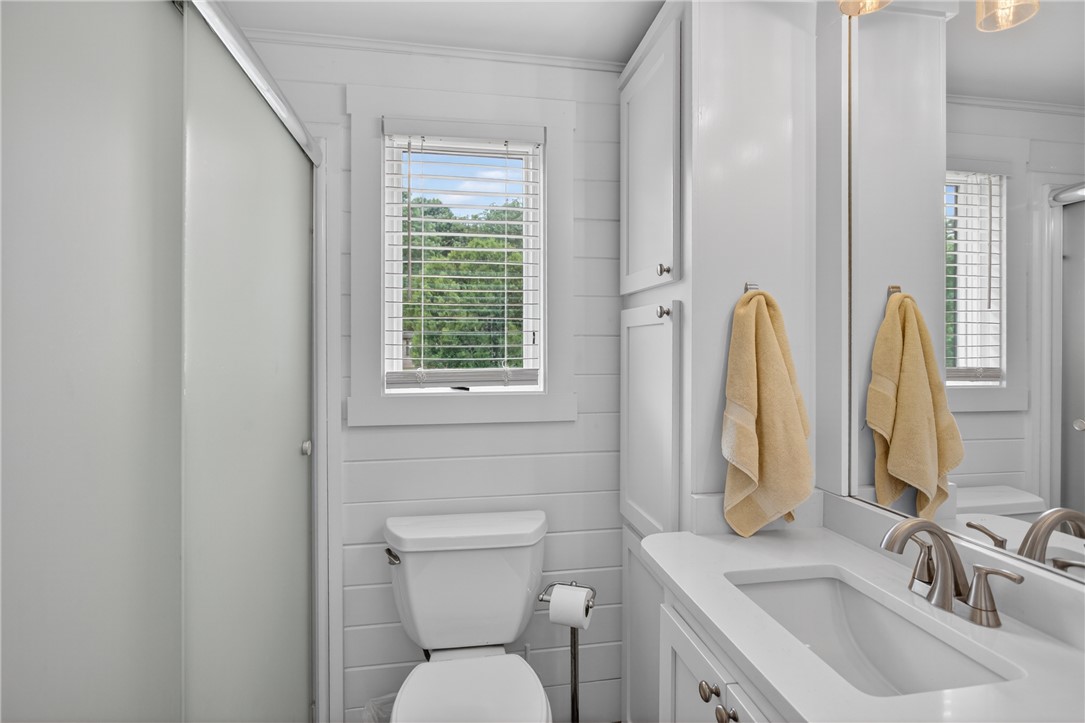 1230 Melton Road, Unit 4 West Union, SC 29696 - Photo 19 of 48 A well-lit bathroom features a vanity with sleek fixtures and ample storage, creating a refreshing space.