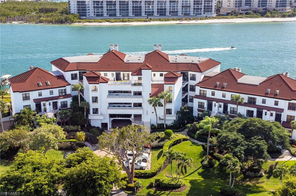a aerial view of a house with a garden and plants