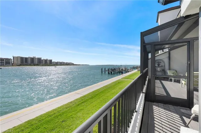 a view of a balcony with an ocean
