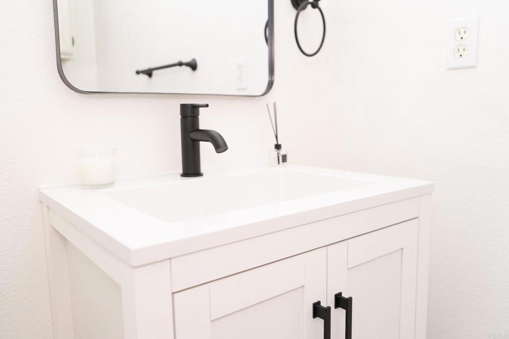 3005 Litt Road Modesto, CA 95355 - Photo 27 of 53 a bathroom with a sink and a mirror