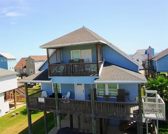 a front view of a house with balcony