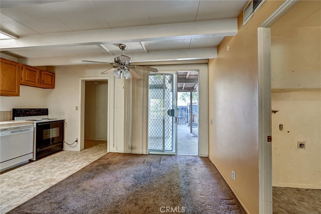 604 Gibbel Road Hemet, CA 92543 - Photo 10 of 29 a view of a hallway with a chandelier