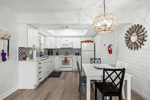 a bathroom with a sink and a shower