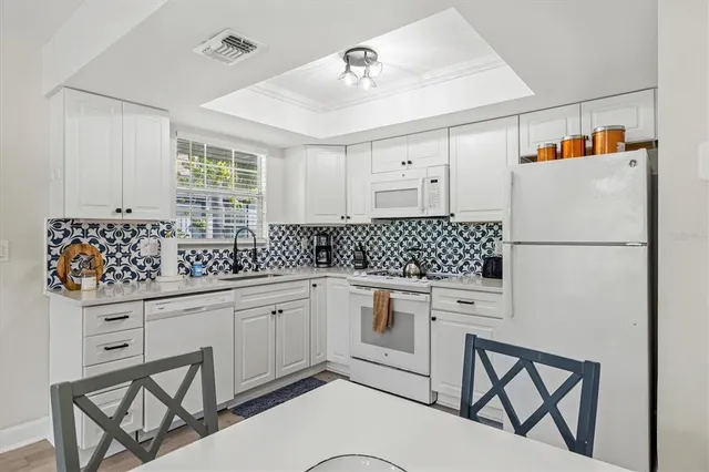 a bedroom with a bed and chair