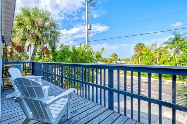 a kitchen with a table chairs and a stove