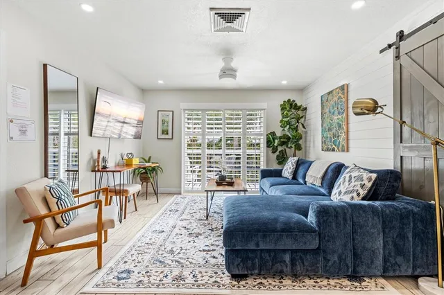 a bedroom with a bed and a desk