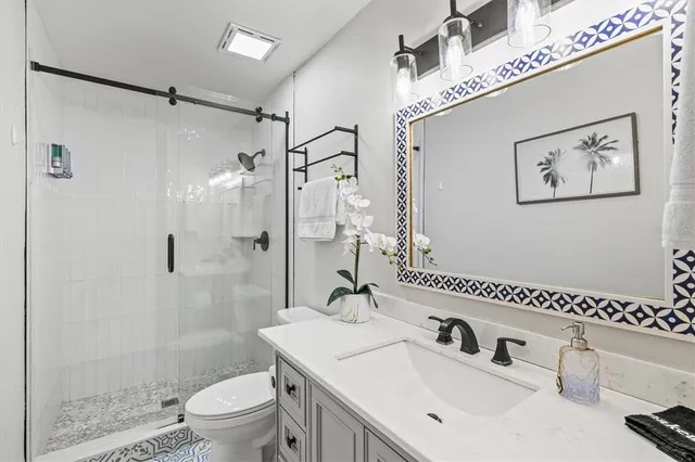 a view of chairs and tables in the patio