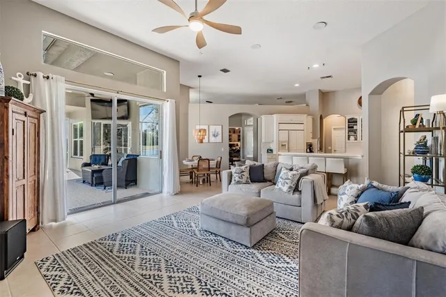 a living room with furniture and a rug