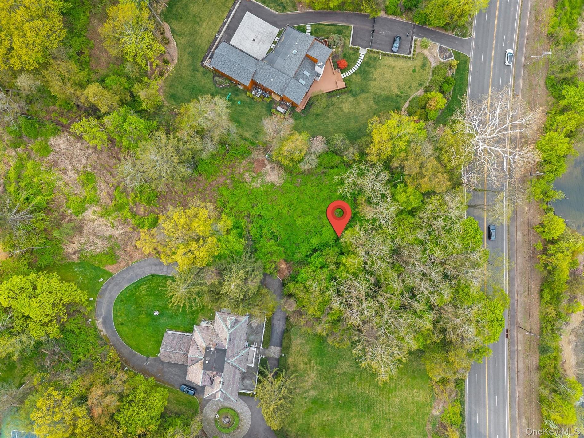 367 A East Shore Road Queens, NY 11023 - Photo 3 of 5 an aerial view of a house with a yard and garden