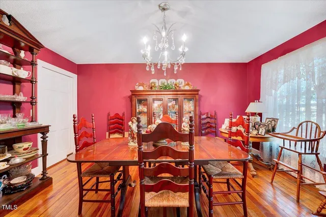 a living room with furniture or couch and a wooden floor