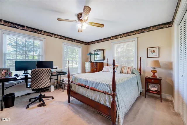 a kitchen with stainless steel appliances wooden cabinets and a stove top oven