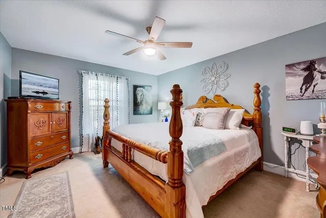 a bathroom with a sink a mirror and a toilet