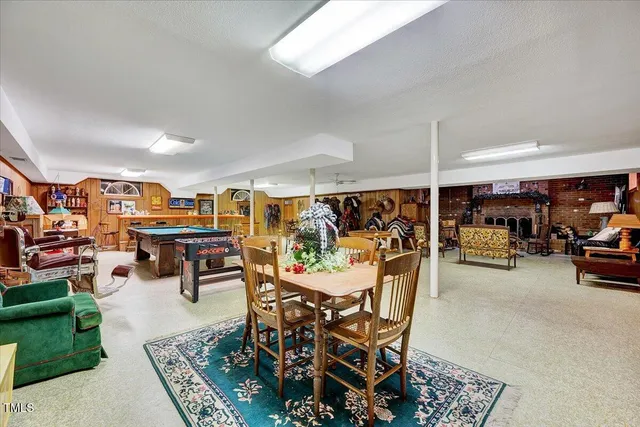 a room with furniture and gym equipment