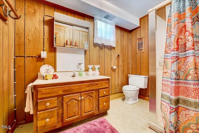 a view of a dining room with furniture and a livingroom