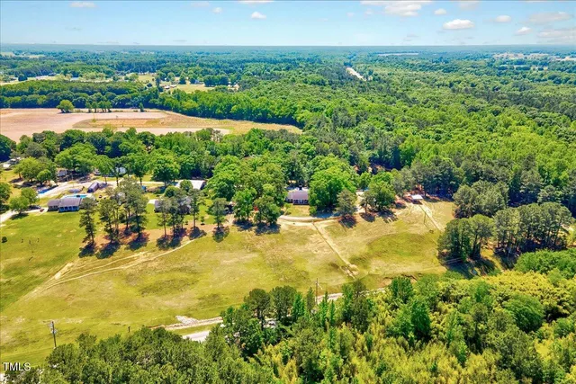 a view of a street with an ocean view