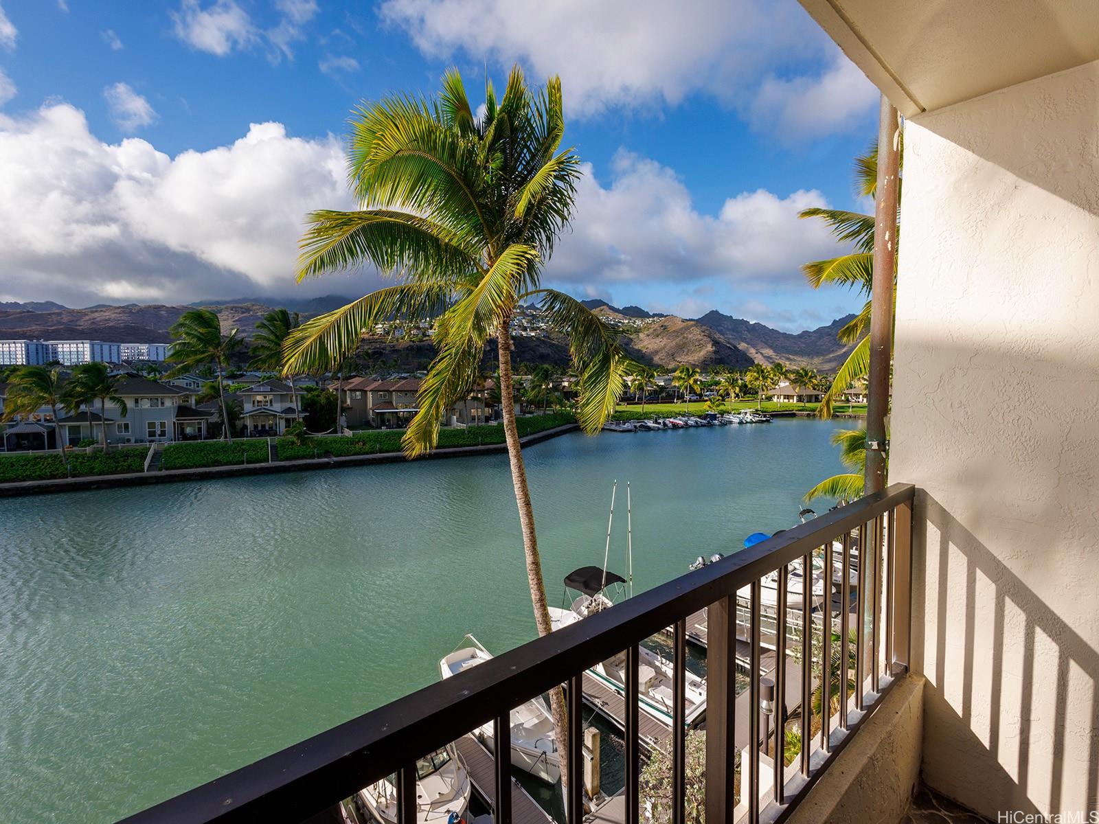 500 Lunalilo Home Road, Unit 13B Honolulu, HI 96825 - Photo 2 of 17 a view of a lake with a mountain in the background