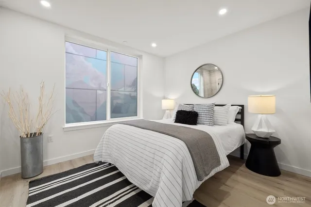 a bedroom with a bed and furniture