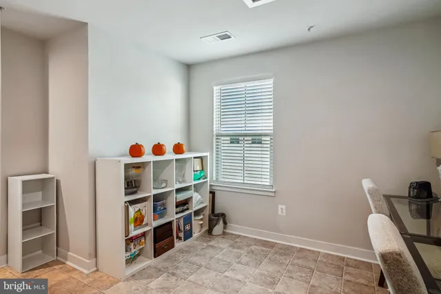 a room with furniture and a window