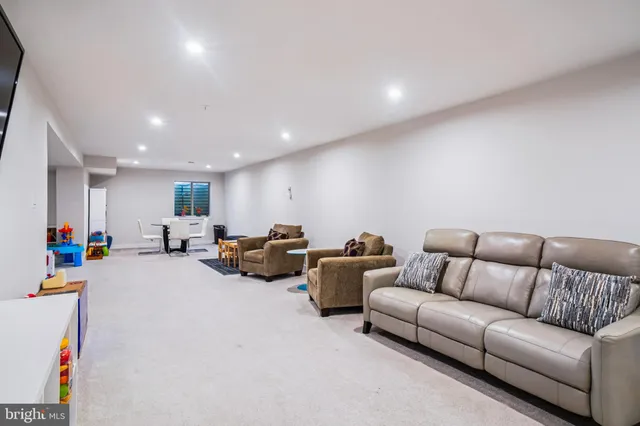 a living room with furniture and a couch