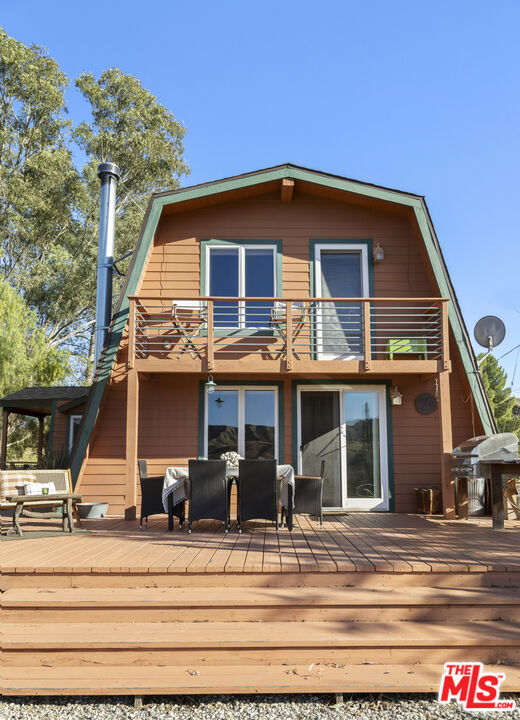 16617 Vasquez Canyon Road Canyon Country, CA 91351 - Photo 33 of 43 a view of a house with a porch
