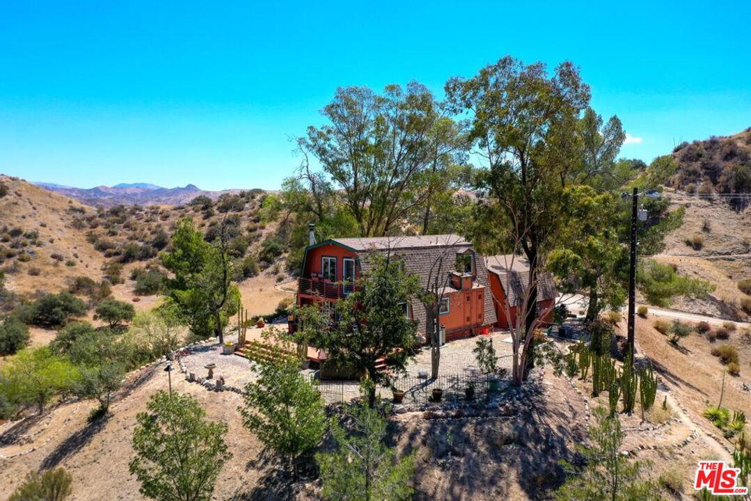 16617 Vasquez Canyon Road Canyon Country, CA 91351 - Photo 40 of 43 an aerial view of a house with a yard