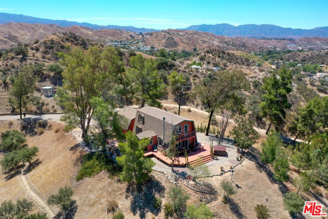 16617 Vasquez Canyon Road Canyon Country, CA 91351 - Photo 41 of 43 an aerial view of a house with a garden