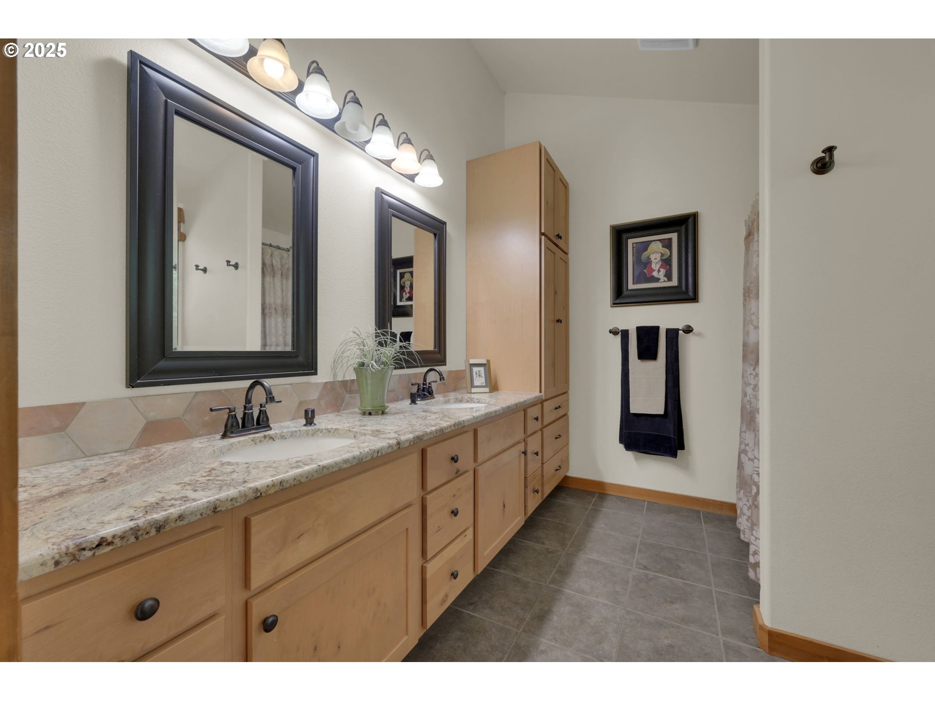 23859 Suttle Road Veneta, OR 97487 - Photo 19 of 46 a bathroom with a granite countertop double vanity sink and a mirror