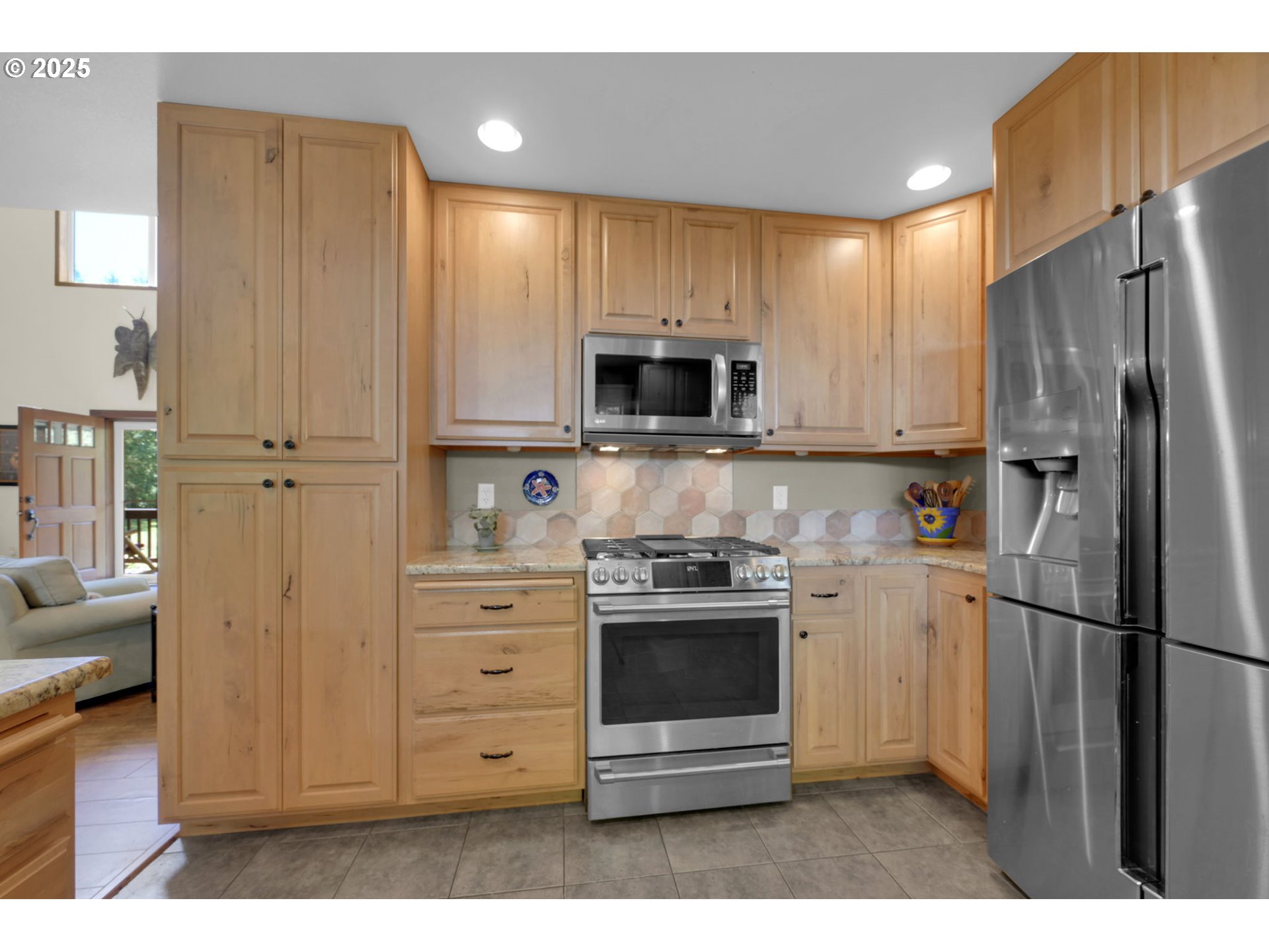 23859 Suttle Road Veneta, OR 97487 - Photo 10 of 46 a kitchen with stainless steel appliances a refrigerator sink and microwave