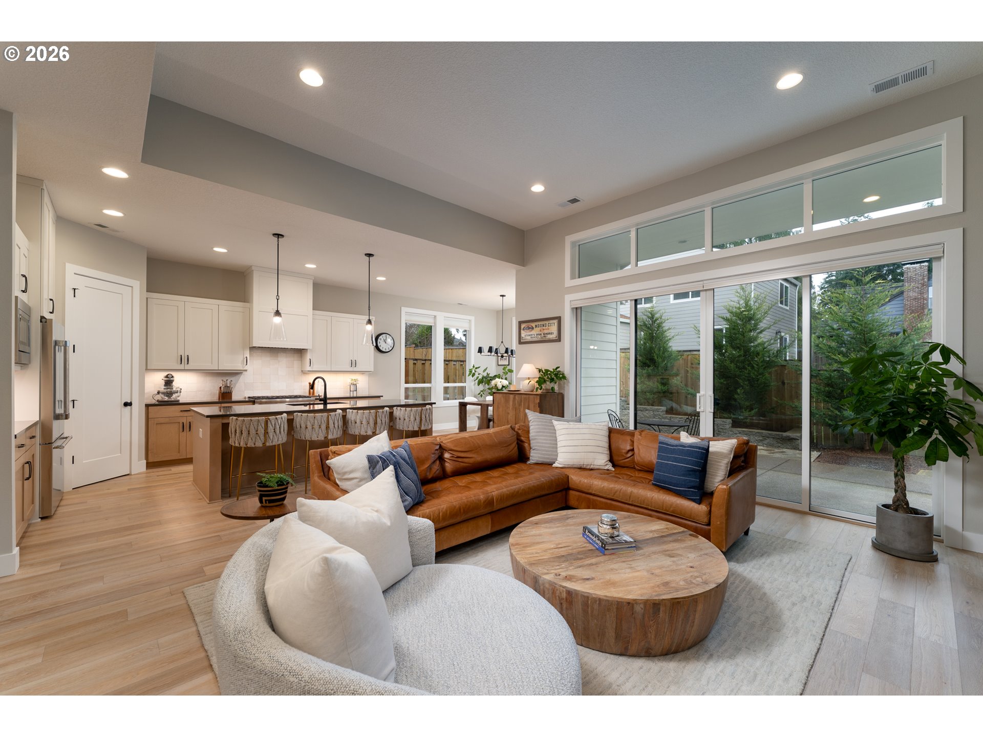 8044 Southwest Knudsen Place Portland, OR 97223 - Photo 15 of 46 a living room with furniture and a large window