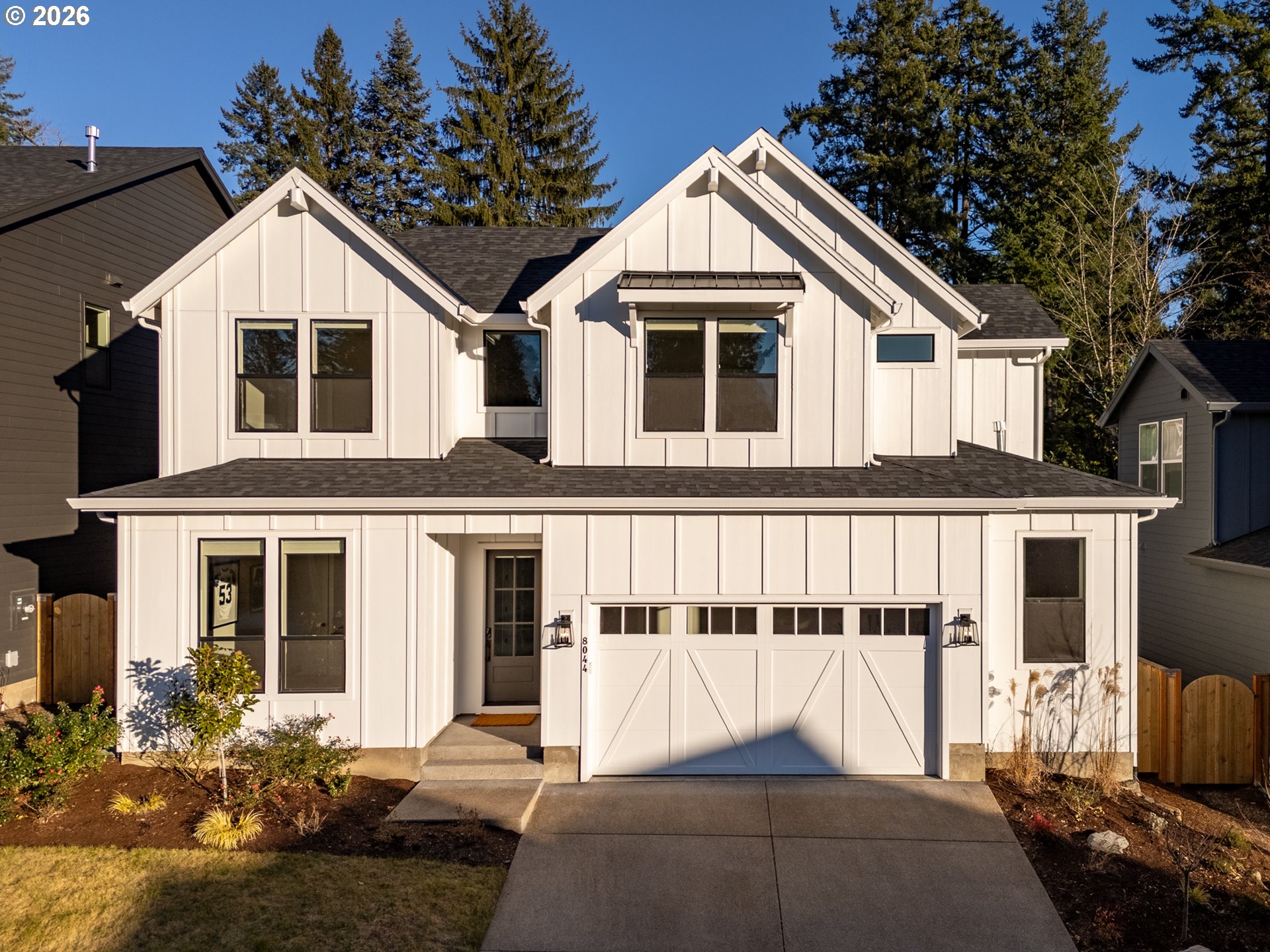 8044 Southwest Knudsen Place Portland, OR 97223 - Photo 2 of 46 a view of a house with a yard