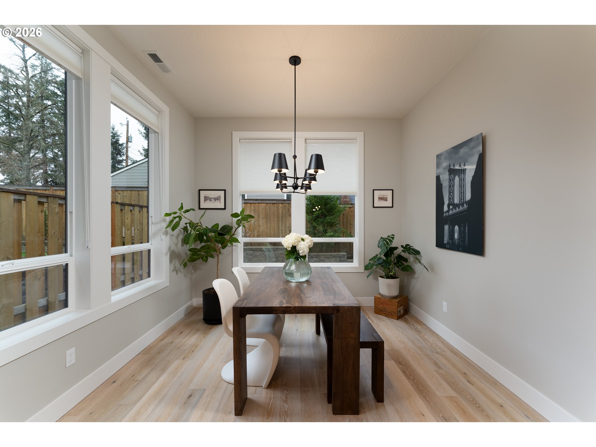 8044 Southwest Knudsen Place Portland, OR 97223 - Photo 23 of 46 a view of a dining room with furniture window and wooden floor