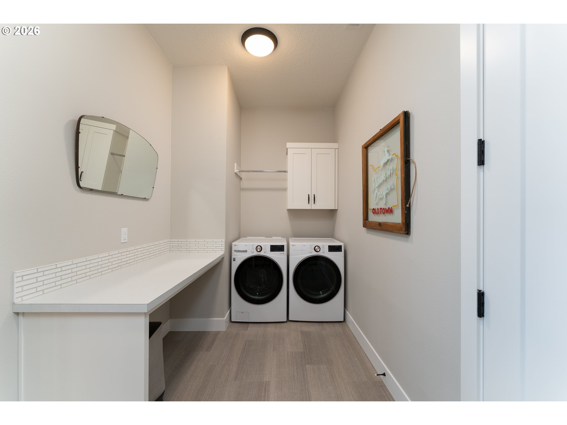 8044 Southwest Knudsen Place Portland, OR 97223 - Photo 35 of 46 a bathroom with a sink and a vanity