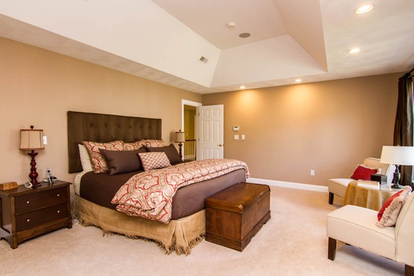 30 Pheasant Hollow Road Natick, MA 01760 - Photo 17 of 30 a spacious bedroom with a bed and a couch