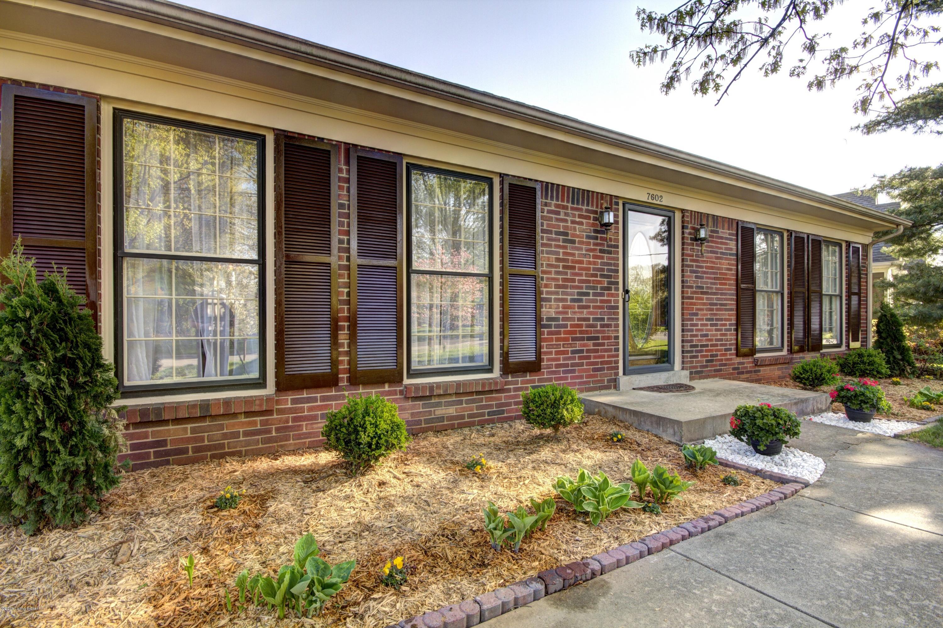 7602 Tempsclair Road Louisville, KY 40220 - Photo 1 of 44 Fresh paint on trim and shutters saves you work.