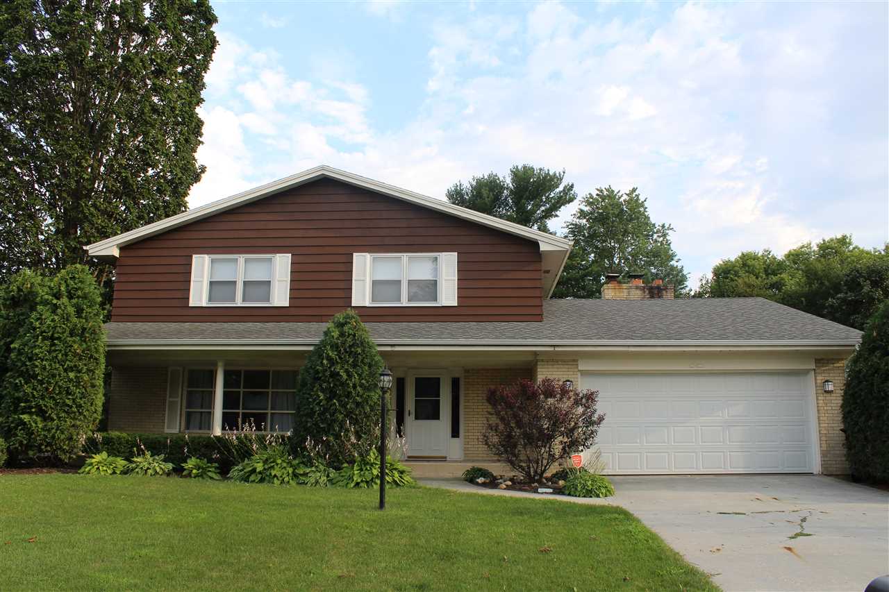 3511 North View Road Rockford, IL 61107 - Photo 1 of 15 a front view of house with yard and green space