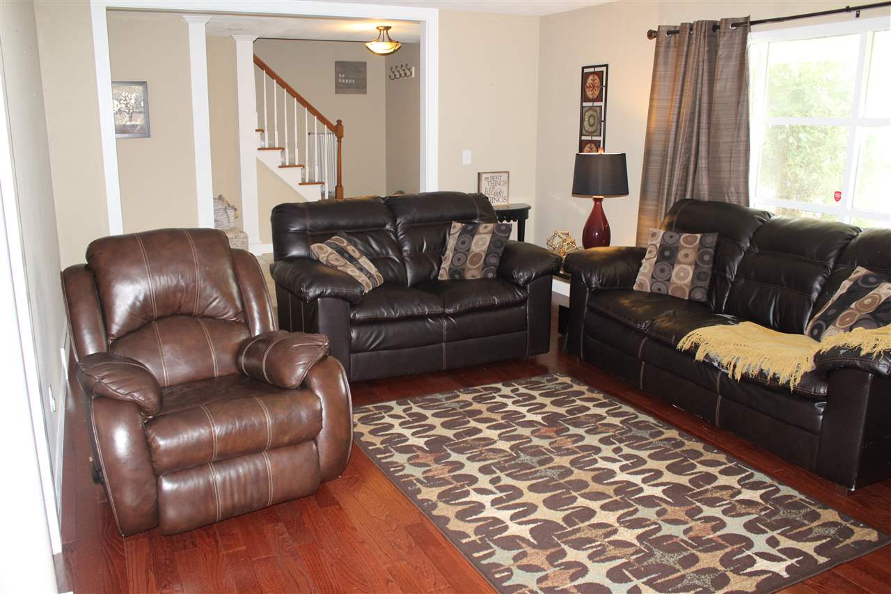 3511 North View Road Rockford, IL 61107 - Photo 3 of 15 a living room with a couch and a rug