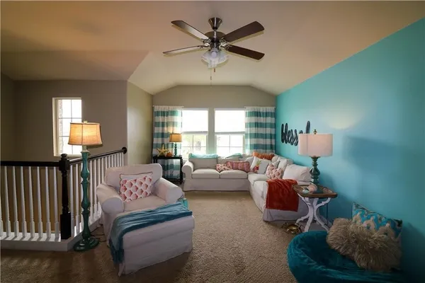 a spacious bathroom with a vanity and a toilet