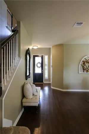 a view of livingroom with furniture and wooden floor