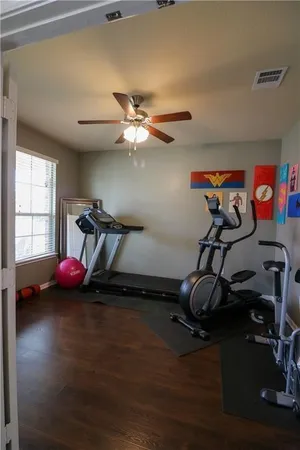 a view of a room with gym equipment