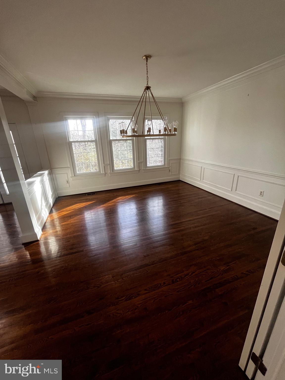 10207 Sundance Court Potomac, MD 20854 - Photo 14 of 21 a view of empty room with wooden floor and fan