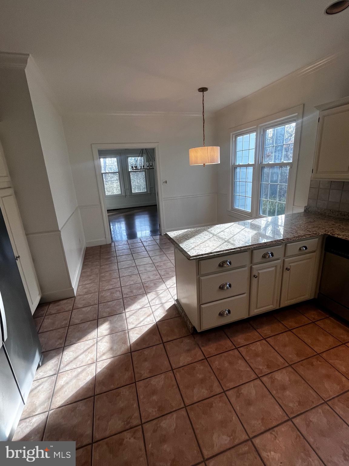 10207 Sundance Court Potomac, MD 20854 - Photo 17 of 21 a kitchen with a sink a stove cabinets and counter space