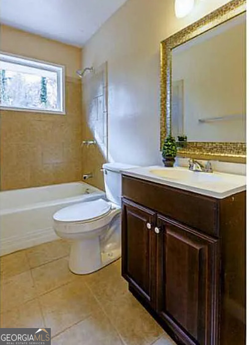 3405 Elgin Drive Decatur, GA 30032 - Photo 6 of 11 a bathroom with a sink a toilet and mirror
