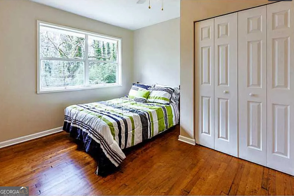 3405 Elgin Drive Decatur, GA 30032 - Photo 10 of 11 a bedroom with a bed and a window