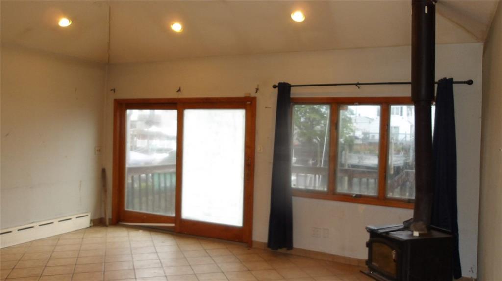 59 Bartlett Place Brooklyn, NY 11229 - Photo 3 of 13 a view of an empty room with a window