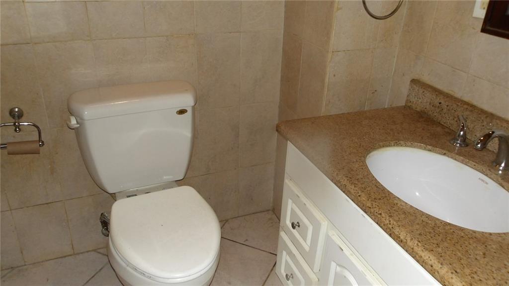 59 Bartlett Place Brooklyn, NY 11229 - Photo 5 of 13 a bathroom with a granite countertop toilet and a sink